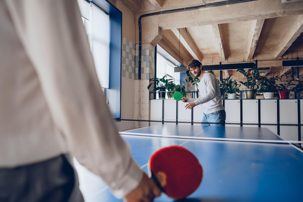 young-people-man-and-woman-playing-table-tennis_93675-134489.jpg